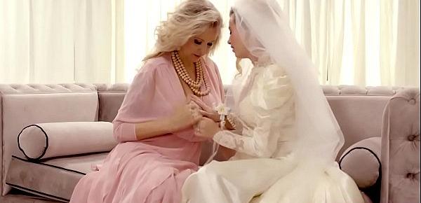 Lesbian MILF surprises her bride dauther with a hot pussy licking session before her wedding day.